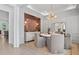 Elegant dining room featuring a modern chandelier, stylish decor, and light gray walls at 4775 Wyat Farm Overlook, Cumming, GA 30040
