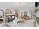 Open-concept living area with modern decor, seamlessly blending kitchen and living spaces for comfortable living at 4775 Wyat Farm Overlook, Cumming, GA 30040