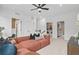 Spacious living room featuring comfortable seating, a modern design, and ample natural light at 4775 Wyat Farm Overlook, Cumming, GA 30040