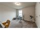 Versatile room with natural light, suitable for a bedroom, home office, or creative space at 592 Eagles Nest Cir, Auburn, GA 30011