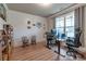 Well-lit office space features a large window and decorative shiplap wall at 592 Eagles Nest Cir, Auburn, GA 30011