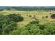 Scenic aerial view showcasing the lush golf course and green landscape surrounding the property at 6204 Santa Fe Pkwy, Atlanta, GA 30350