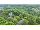 Aerial view of an apartment complex nestled among lush greenery, providing a secluded and peaceful living environment at 6204 Santa Fe Pkwy, Atlanta, GA 30350