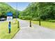 Scenic walking trail perfect for a stroll, surrounded by lush greenery and trees at 6204 Santa Fe Pkwy, Atlanta, GA 30350