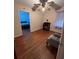 Bedroom with hardwood floors, ceiling fan and desk at 167 Mathews Se Cir, Marietta, GA 30067