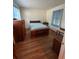 Bedroom with hardwood floors and dresser at 167 Mathews Se Cir, Marietta, GA 30067