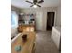 Eat-in kitchen with tile flooring, wood cabinets, and a window at 167 Mathews Se Cir, Marietta, GA 30067