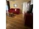 Bright living room featuring hardwood floors, a comfortable sofa, and classic decor at 167 Mathews Se Cir, Marietta, GA 30067