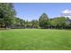 Expansive green community lawn perfect for outdoor activities and gatherings at 2759 Thomashire Trce, Marietta, GA 30066