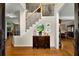 Inviting foyer with hardwood floors, elegant staircase, and sophisticated decor create a welcoming entry at 2759 Thomashire Trce, Marietta, GA 30066