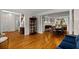 Open-concept living and dining area with hardwood floors and elegant architectural details at 2759 Thomashire Trce, Marietta, GA 30066