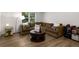 Inviting living room featuring a large sectional couch at 2759 Thomashire Trce, Marietta, GA 30066