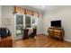 Bright office space with a desk, hardwood floors, and large windows for natural light at 2759 Thomashire Trce, Marietta, GA 30066