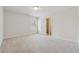 Bright and airy bedroom featuring neutral carpet and a closet at 3182 Hartford Mill Pl, Duluth, GA 30097