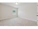 Bright bedroom with a window providing natural light and soft carpet flooring at 3182 Hartford Mill Pl, Duluth, GA 30097