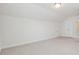 Spacious bonus room features plush carpet, neutral paint, and lots of natural light at 3182 Hartford Mill Pl, Duluth, GA 30097