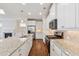Kitchen with granite countertops, stainless steel appliances, and plenty of cabinet space at 3182 Hartford Mill Pl, Duluth, GA 30097