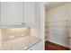 Walk-in pantry with ample shelving and easy access from the kitchen area at 3182 Hartford Mill Pl, Duluth, GA 30097