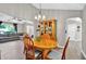Elegant dining room with hardwood floors, chandelier, and ample seating, perfect for Gathering meals and entertaining guests at 804 Rose Creek Walk, Woodstock, GA 30189