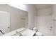 Bright bathroom featuring a tub and shower combination, paired with a neutral-toned vanity at 900 Ellesmere Pt, Mcdonough, GA 30253