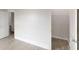 Bright bedroom featuring luxury vinyl flooring and a convenient walk-in closet for ample storage at 900 Ellesmere Pt, Mcdonough, GA 30253