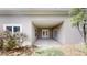 Covered patio, perfect for outdoor entertaining and relaxation with a backyard garden at 900 Ellesmere Pt, Mcdonough, GA 30253