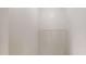 A compact walk-in closet offers practical storage solutions with hanging racks at 900 Ellesmere Pt, Mcdonough, GA 30253