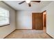 Bedroom with carpet, window, and closet, offering natural light and storage at 2584 Gravitt Rd, Duluth, GA 30096