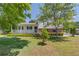 Charming two-story home with a welcoming front porch and well-manicured lawn at 2584 Gravitt Rd, Duluth, GA 30096