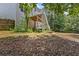 View of a multi-level deck with stairs descending into the yard, offering easy access to outdoor entertaining areas at 3014 Volland Grove Trail, Lawrenceville, GA 30043