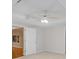 This bright bedroom features neutral carpet, two windows, and an open door at 3014 Volland Grove Trail, Lawrenceville, GA 30043