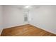 Bright bedroom features a ceiling fan, wood floors and closet at 3014 Volland Grove Trail, Lawrenceville, GA 30043