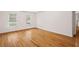 Bright bedroom with hardwood floors and windows offering natural light at 3014 Volland Grove Trail, Lawrenceville, GA 30043