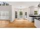 Open kitchen with granite countertops and eat in kitchen, breakfast area with large bay window at 3014 Volland Grove Trail, Lawrenceville, GA 30043