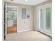 Bright mudroom has tile flooring, an open door, and French doors at 3014 Volland Grove Trail, Lawrenceville, GA 30043