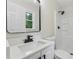 This bathroom has a stylish vanity and a shower and bathtub combination at 3757 Cindy Dr, Douglasville, GA 30135