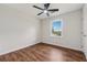Bright bedroom featuring hardwood floors, ceiling fan and a nice view outside at 3757 Cindy Dr, Douglasville, GA 30135
