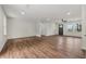 Spacious living area with sleek flooring, recessed lighting, and fresh paint, offering a modern and airy feel at 3757 Cindy Dr, Douglasville, GA 30135