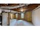 Unfinished basement with concrete flooring and framing ready for customization and renovations at 4912 Lightwood Nw Ct, Acworth, GA 30102
