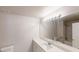 Bathroom featuring a large mirror and a white vanity with ample counter space at 4912 Lightwood Nw Ct, Acworth, GA 30102