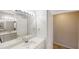 Bright bathroom featuring a double vanity with a large mirror and good lighting at 4912 Lightwood Nw Ct, Acworth, GA 30102