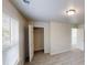 Bedroom featuring carpeting, neutral walls, closet, and natural light from window at 4912 Lightwood Nw Ct, Acworth, GA 30102