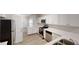 Modern kitchen with white cabinets, stainless steel appliances and gorgeous countertops at 4912 Lightwood Nw Ct, Acworth, GA 30102