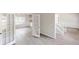 Living room and staircase with white trim, hardwood floors, and lots of natural light at 4912 Lightwood Nw Ct, Acworth, GA 30102