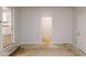 Unfinished garage space with access to the kitchen and potential for customization at 7125 Puckett Sw St, Covington, GA 30014