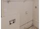 Utility room with hookups, ready to be transformed into a functional laundry space at 7125 Puckett Sw St, Covington, GA 30014