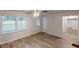 Inviting living space with wood-look floors and ample natural light at 7125 Puckett Sw St, Covington, GA 30014