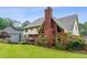 Large green backyard and beautiful brick exterior at 9545 Kingston Crossing Cir, Alpharetta, GA 30022