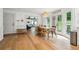 Eat-in kitchen featuring views to the dining and living room with access to the backyard at 9545 Kingston Crossing Cir, Alpharetta, GA 30022