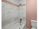 Bathroom with marble tile shower and separate bathtub at 11950 Wildwood Springs Dr, Roswell, GA 30075